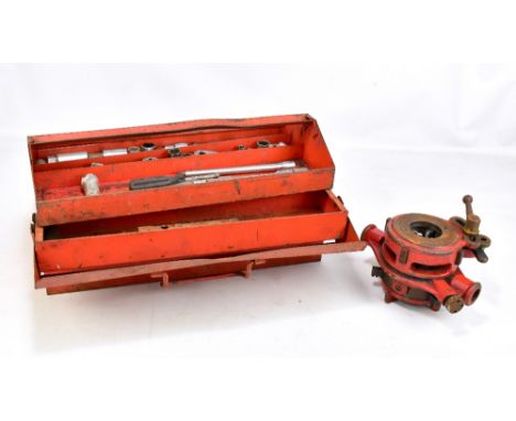 A collection of vintage automobile tools housed in an orange painted Brittol box with pull out tray and an automobile winch.A