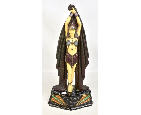 VERONESE; an Art Deco style resin figurine modelled in the form of a dancing figure with out swept arms holding a flowing cap