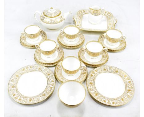 WEDGWOOD; a gold Florentine pattern tea service, twenty-four peices.Additional InformationGeneral use, wear marks throughout,