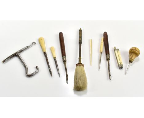 A small collection of button hooks including a folding example, treen handled example, etc.Additional InformationGeneral wear