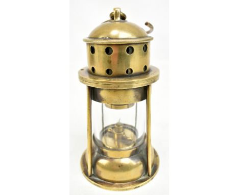 A very rare J. Rayner's Patent miner's brass flame safety lamp with stamped marks and loop handle, height 18cm.Additional Inf