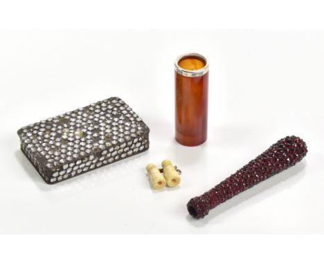A Georgian base metal snuff box with jewelled decoration, length 8cm, a parasol handle with garnet decoration, length 9.5cm, 