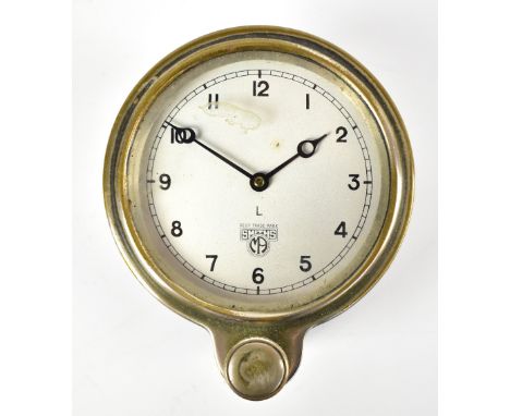 SMITHS; a vintage car dashboard clock, the circular dial set with Arabic numerals, with nickel plated dial surround and lacqu