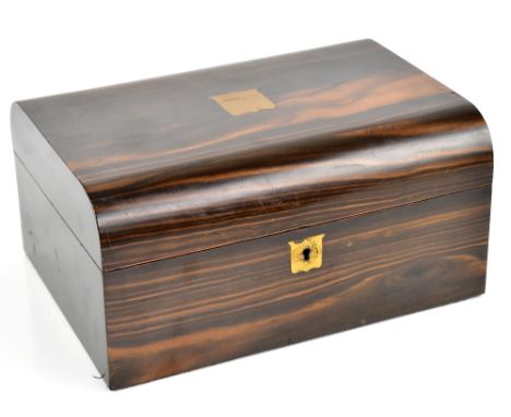 A Victorian&nbsp;coromandel veneered sewing box, the hinged cover enclosing fitted compartments and trays containing numerous