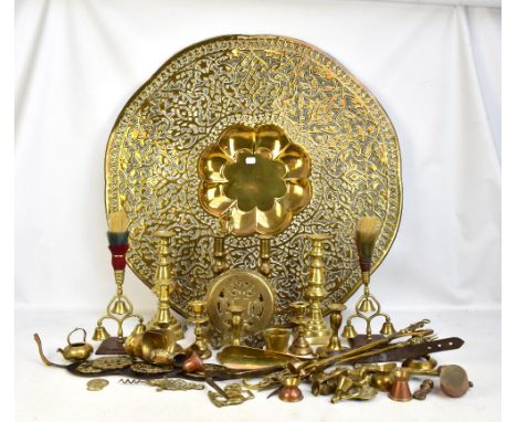 A large 20th century Middle Eastern brass charger with arabesque decoration, unmarked, diameter 77cm, and further brassware i