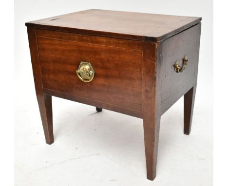 A 19th century mahogany commode stool, the hinged cover enclosing an empty compartment with three loop handles, height 47cm, 