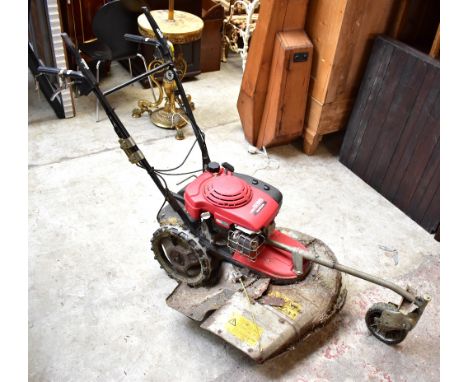 HONDA; a petrol UM536 lawnmower.Additional InformationArea of the bottom plate has corroded and is rotted, general wear, the 