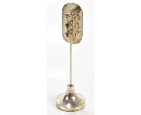 A contemporary novelty silver plated paperweight modelled in the form of a traffic light stand, unmarked, height 20cm.Additio