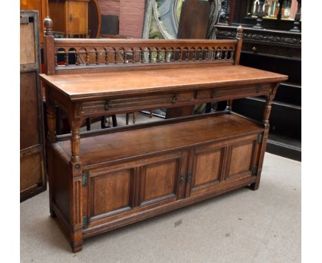 GILLOW &amp; CO OF LANCASTER; an Aesthetic Movement mahogany buffet with pierced gallery back above two drawers and shelf wit