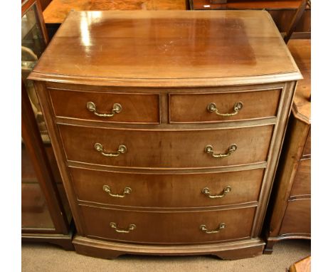 A reproduction mahogany bowfronted chest of two short over three long drawers on bracket supports, height 102cm, width 86cm, 