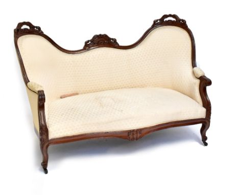 A Victorian mahogany and cream upholstered sofa with serpentine front and shaped back, length 162cm.Additional InformationWil