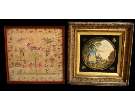 A Georgian tapestry panel depicting a lady walking a dog in landscape scene inside gilt floral panels, 28 x 28cm, set in orna