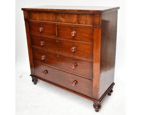 A Victorian mahogany chest of drawers, with secret single drawer to the top above two short and three long drawers, raised in