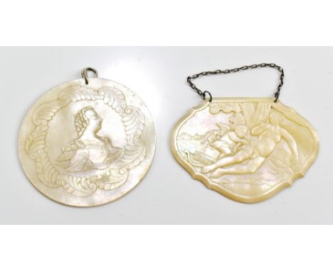 Two 19th century mother of pearl pendants including a circular example with portrait bust, diameter 7.5cm, the second example