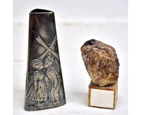 BLUE JOHN; a natural cut stone raised on plinth base, purchased circa 1980, height 9cm, and a WMF pewter vase depicting a Dut