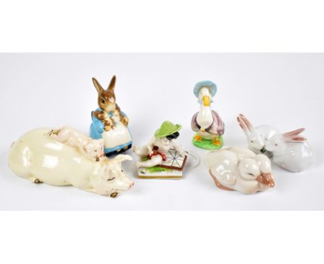 A mixed group of ceramic figures comprising Beswick Beatrix Potter 'Jemima Puddleduck' and 'Mrs Rabbit and Bunnies', Royal Co