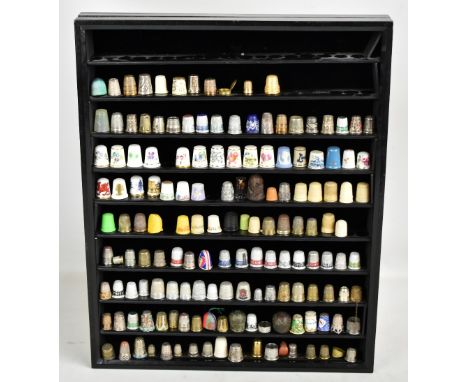 A large collection of white metal, silver plated, ceramic and further thimbles to include Hammersley enamel examples, Caversw
