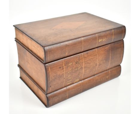 A 19th century mahogany, bird's eye maple and further inlaid tea caddy modelled as a stack of three books, inscribed 'Psalms'