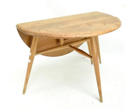 ERCOL; a light elm drop leaf coffee table, raised on column support, height 40cm, length 60cm.Additional InformationThe top i