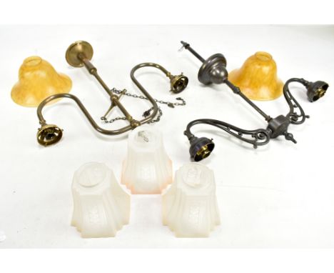 Two early/mid-20th century brass and patinated brass twin branch light fittings, width of latter and slightly larger approx 5