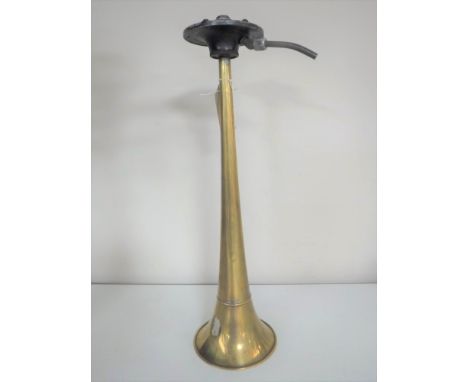 A vintage brass horn from a boat