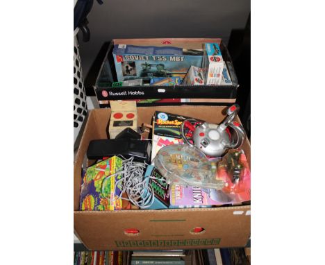 Two boxes containing vintage toys and games, airfix modelling kits etc