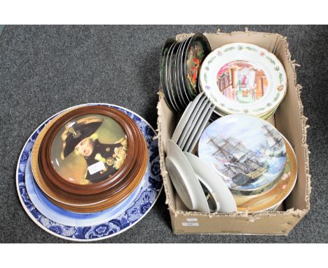 A large quantity of assorted wall and cabinet plates including Royal Worcester Christmas plates, Warship collector's plates e