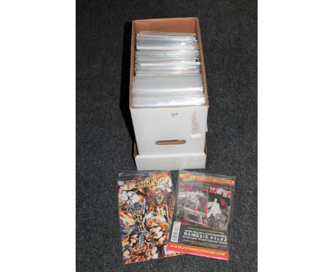 A box containing 21st century Marvel and DC comic including Deadpool, Green Arrow, Bruce Wayne etc