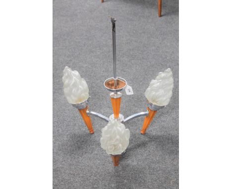 An Art Deco chrome three way light fitting with flame shades