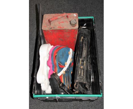 A crate containing vintage leather satchel, vintage oil can, contemporary framed mirror and wall plaques