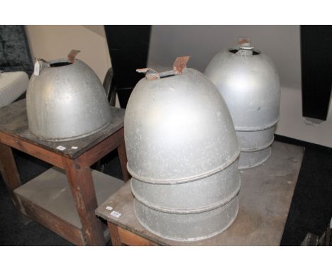 Seven mid 20th century aluminium glass lined industrial light shades 