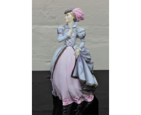 A Royal Worcester china figurine : Masquerade, height 20 cm. 