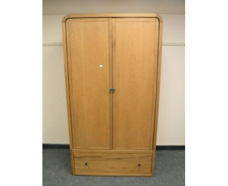 A Barker &amp; Stonehouse light oak wardrobe fitted with a drawer, width 100 cm 