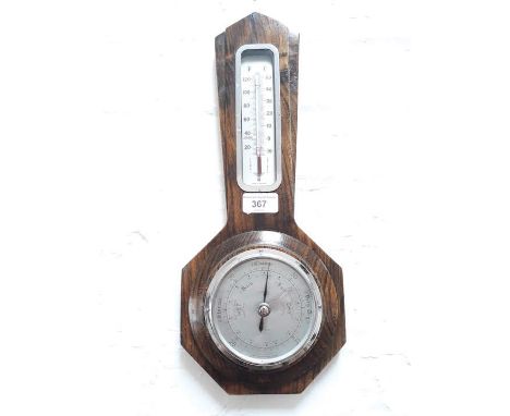 An oak aneroid barometer, length 40cm.  