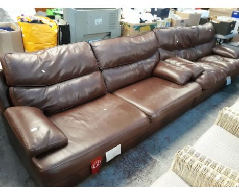 Three seater and two seater brown leather settees and a pouffe  
