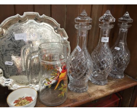 Three Waterford glass decanters and three other itemsCondition: Large chip to one stopper, only 2 stoppers match, minor chip 