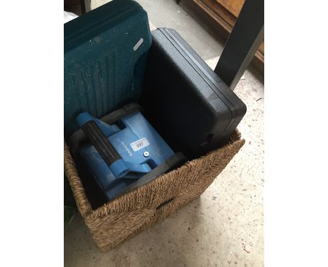 basket of tools in cases  