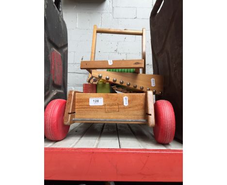 A vintage toddler push along truck with bricks and 2 abacus  