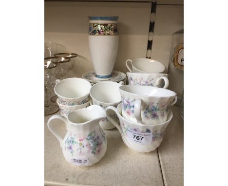 Wedgwood cups, saucers and a vase  