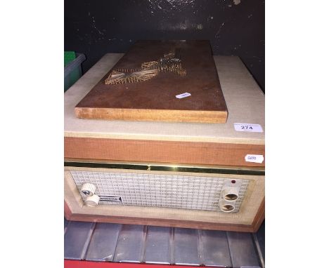 A vintage Dansette portable gramophone and a few 45s  
