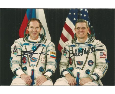 Valeri Tokarev Russian Soyuz Cosmonaut and William McArthur American Soyuz Cosmonaut signed 6 x 4 colour photo. These famous 