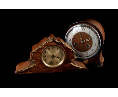 A Black Forrest 30hr Mantle clock, together with an art deco oak mantle clock, smaller oak example with brass decoration and 