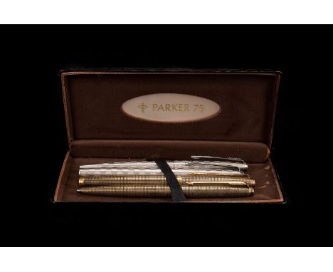 A Parker 75 gold plated silver fountain pen and biro pen set, in box, together with a Parker roller ball and biro set (5)