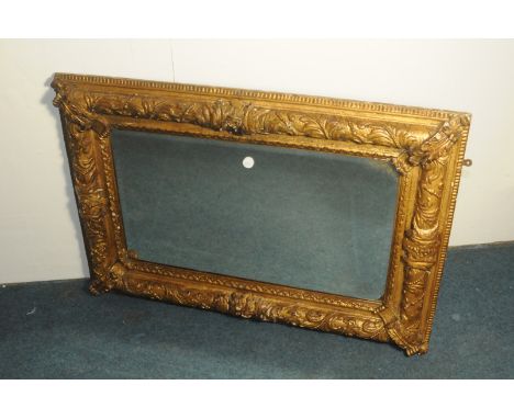 A good 19th century gilt wall mirror, with ornate surround