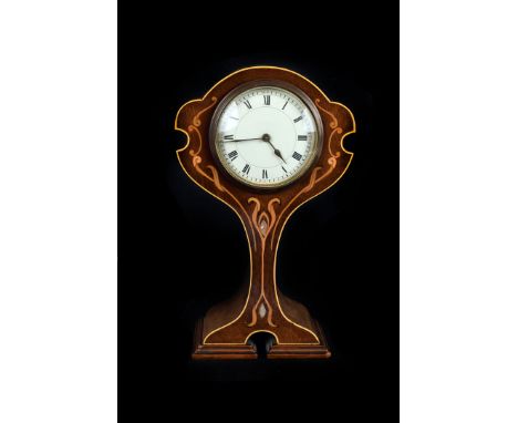 An Art Nouveau inlaid clock, the face having black Roman numerals, in in hour glass style body with mother of pearl and satin
