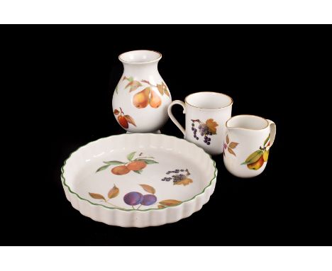 A large collection of Evesham pattern Royal Worcester ceramics, including, tureens, sauce boats, ramekins, salt & pepper, cak