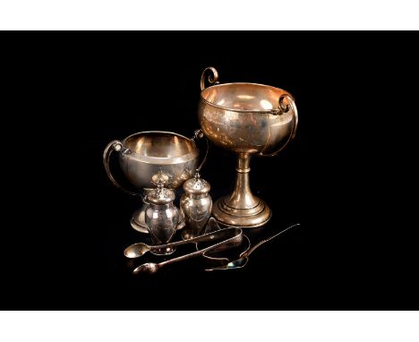 A small group of assorted silver, including two early to mid-20th century trophies, Christening flatware, and more 14ozt.  