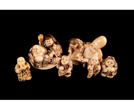Two Chinese Immortal Figural groups, together with four Netsuke figures. 