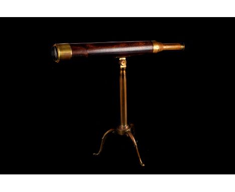 A Gentleman's telescope, by P Dolland of Strand, London, the mahogany casing with on brass tripod with hinged legsslides smoo