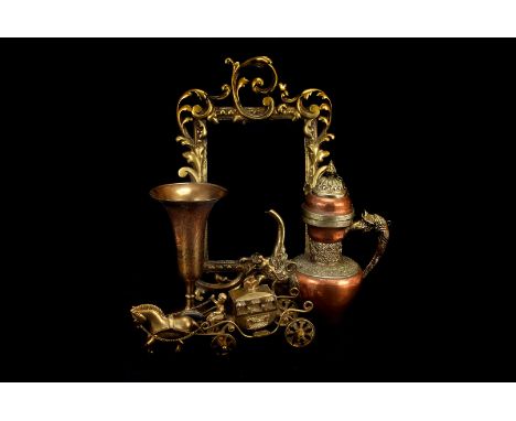 A collection of various metal ware, including a brass picture frame, a mixed metal kettle, a lamp base, a horse and carriage 